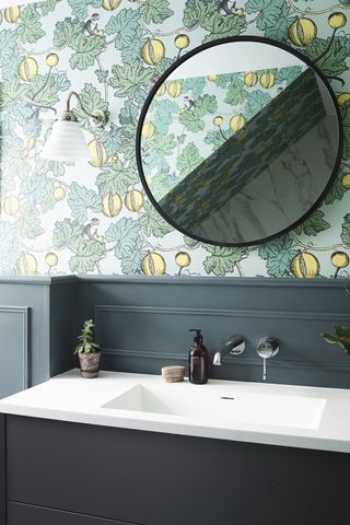 Small bathroom with botanical palm wallpaper