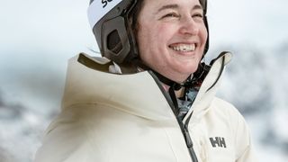 Skier laughing wearing the Helly Hansen Kvitfjell Race jacket