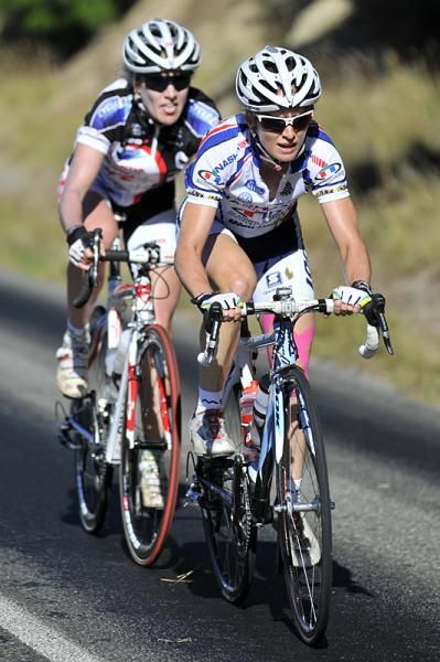 The NZCT New Zealand National Team pose for a photo at the head of the peloton.