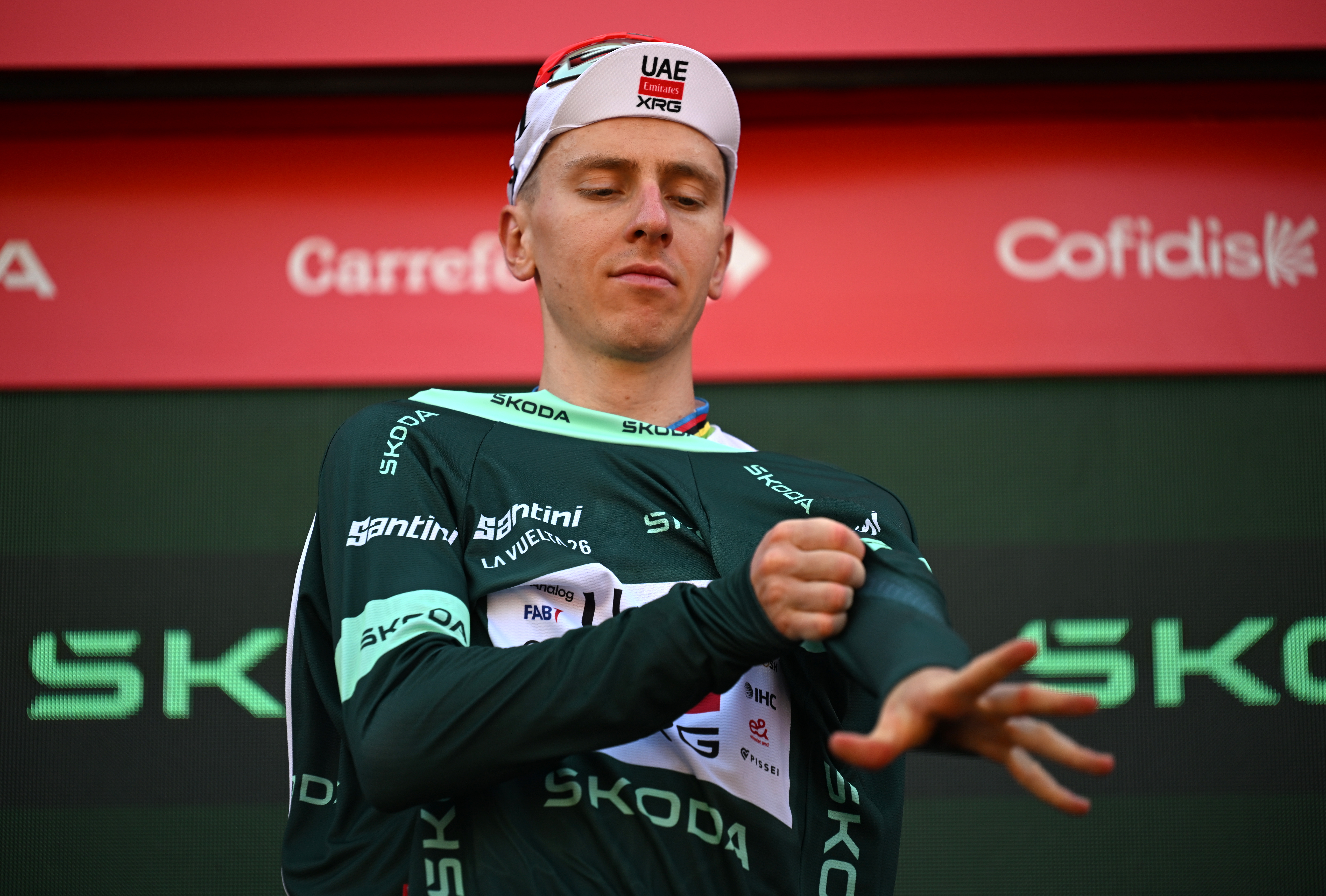 MANOSQUE, MONACO - AUGUST 23: Tadej Pogacar of Slovenia and UAE Team Emirates XRG celebrates at podium as Green points jersey winner during the La Vuelta - 81st Tour of Spain 2026, Stage 2 a 214.3km from Monaco to Manosque 408m / #UCIWT / on August 23, 2026 in Manosque, Monaco. (Photo by Tim de Waele/Getty Images)