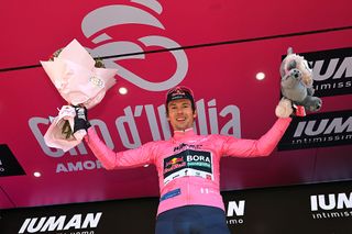TIRANA ALBANIA MAY 10 Primoz Roglic of Slovenia and Team Red Bull BORA hansgrohe celebrates at podium as Pink Leader Jersey winner during the 108th Giro dItalia 2025 Stage 2 a 137km individual time trial stage from Tirana to Tirana UCIWT on May 10 2025 in Tirana Albania Photo by Tim de WaeleGetty Images