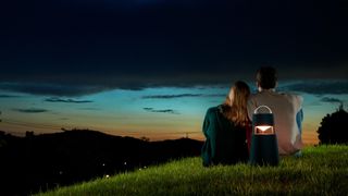 A couple enjoying the next sky with an LG XBoom 360