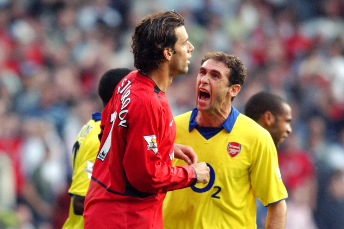 Arsenal&#039;s Martin Keown confronts Manchester United&#039;s Ruud van Nistelrooy after the latter&#039;s penalty miss during the Premier League match at Old Trafford, September 2003