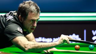 Ronnie O'Sullivan of England plays a shot in the Semifinal match against Mark Allen ahead of the Masters snooker live stream 2025