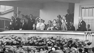 Excitement in the royal box as the Queen's horse Choirboy wins the Royal Hunt Cup at Ascot, 17th June 1953. Queen Elizabeth II is accompanied by the Queen Mother and Princess Marina, Duchess of Kent.