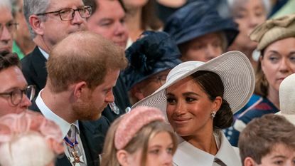 Meghan’s secret message to Prince Harry decoded by lipreader