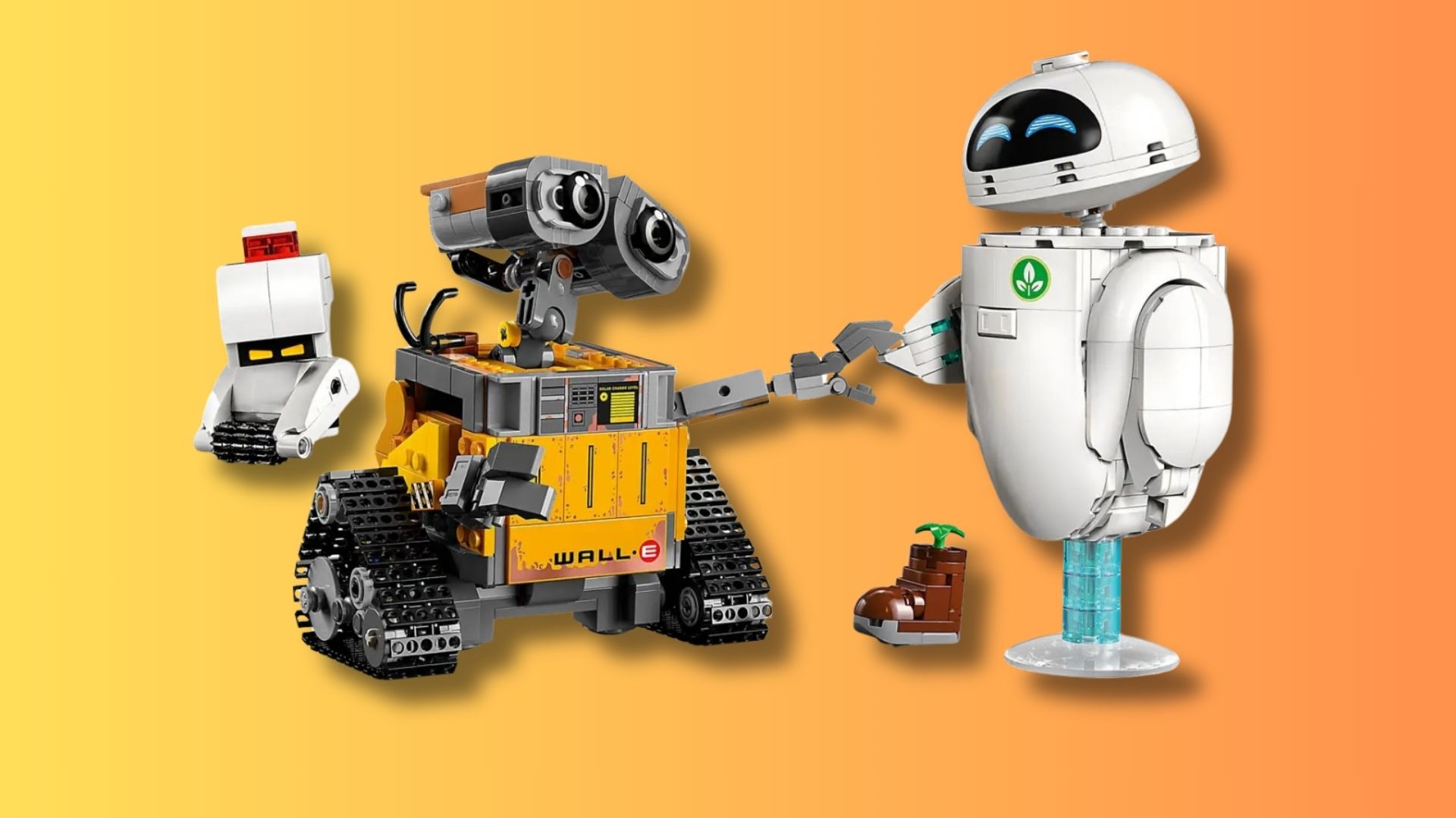 The WALL-E and Eve LEGO set on a gradient orange background holding hands