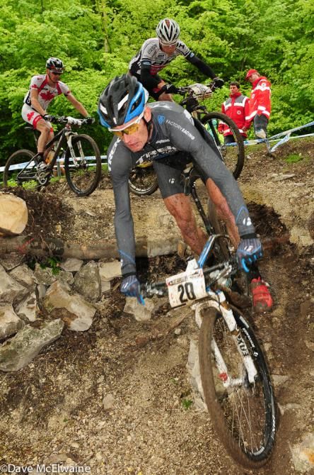 Dan McConnell (Trek Factory Racing) descending a drop on lap one