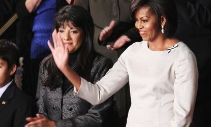 Michelle Obama earned kudos for wearing an American dress to the State of the Union speech â€” but was faulted for failing to show off her biceps.