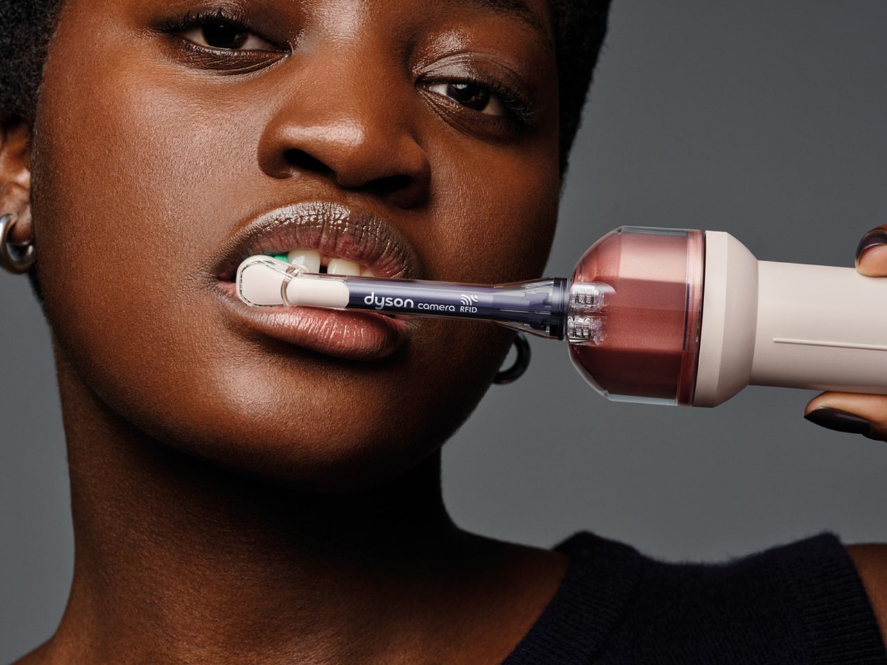 The new Dyson CameraJet Toothbrush in use
