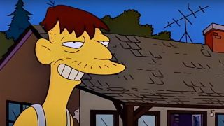 A close up of Cletus smiling on The Simpsons.