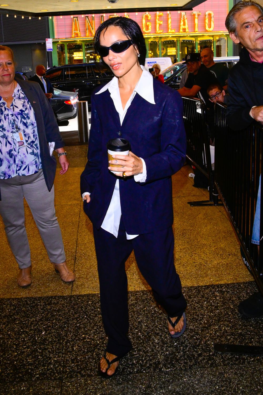 Zoe Kravitz Trouser suit and flip flops