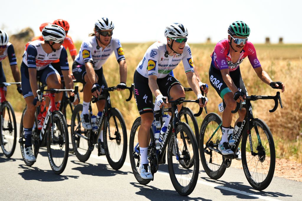 VILLADIEGO SPAIN JULY 29 Sam Bennett of Ireland and Team Deceuninck QuickStep Felix Grossschartner of Austria and Team BoraHansgrohe Purple Leader Jersey during the 42nd Vuelta a Burgos 2020 Stage 2 a 168km stage from Castrojeriz to Villadiego VueltaBurgos on July 29 2020 in Villadiego Spain Photo by David RamosGetty Images