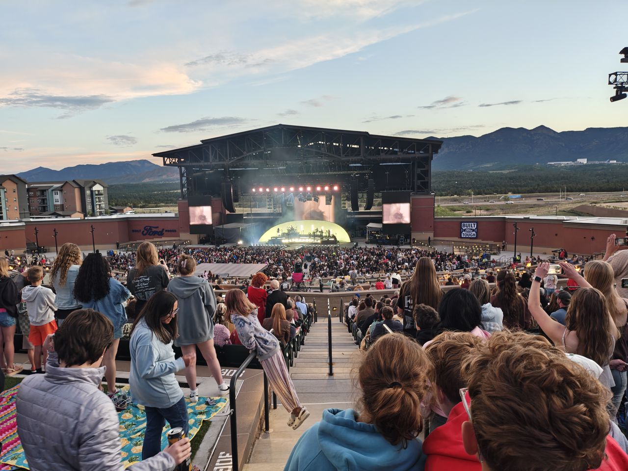 Photos of a stage at an outdoor concert