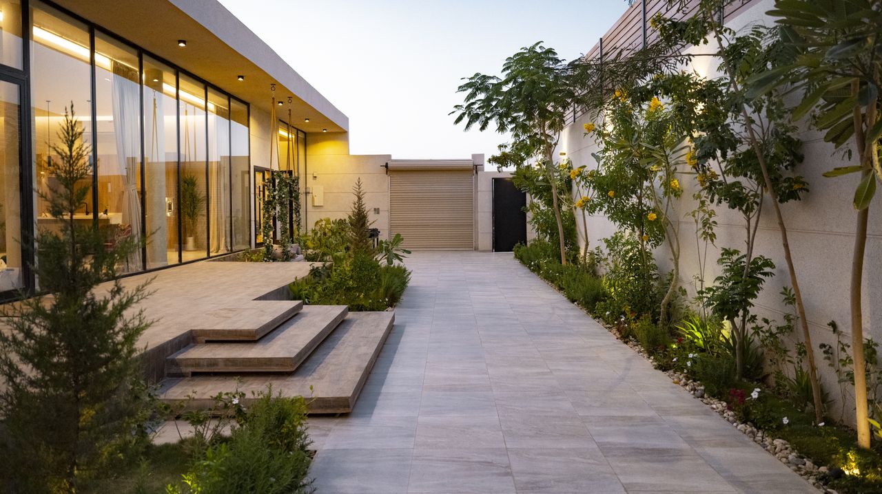 patio lighting on a house with full length glass windows