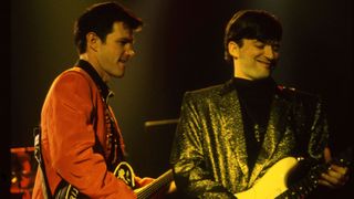 Chris Isaak and James Calvin Wilsey perform on stage at The Town And Country Club, Kentish Town, London, United Kingdom, 1991.