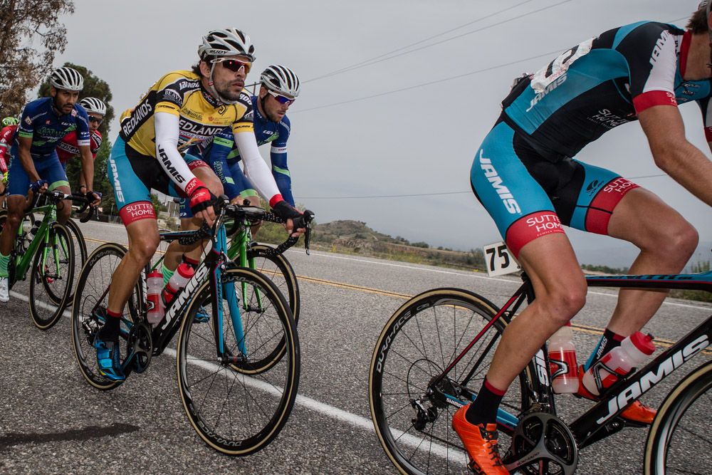 Ruben Companioni (Jamis) sits in the bunch protected by teammates