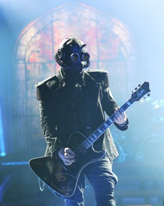 Nameless Ghoul of Ghost performs at a sold out Resorts World Arena on April 15, 2022 in Birmingham, England.