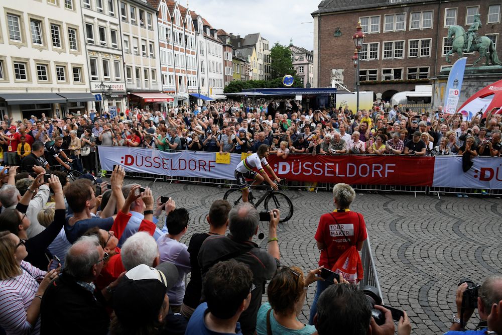 Peter Sagan rides through a sea of fans at the Tour de France team presentation