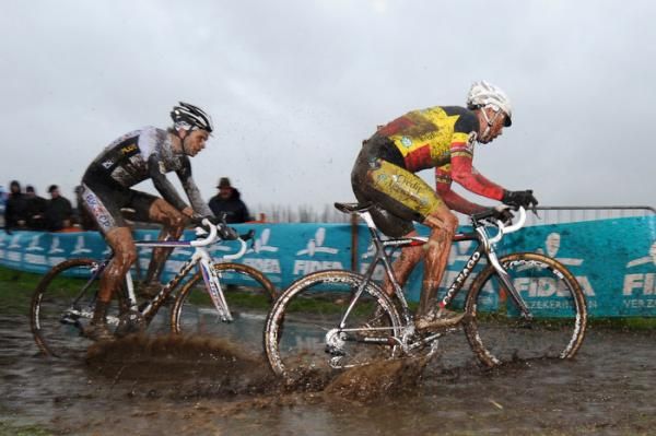 Belgian champion Sven Nys powers through the slop ahead of Niels Albert.