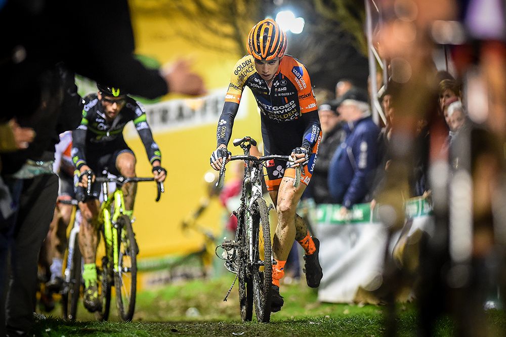 Wout Van Aert pushes his bike to the pits