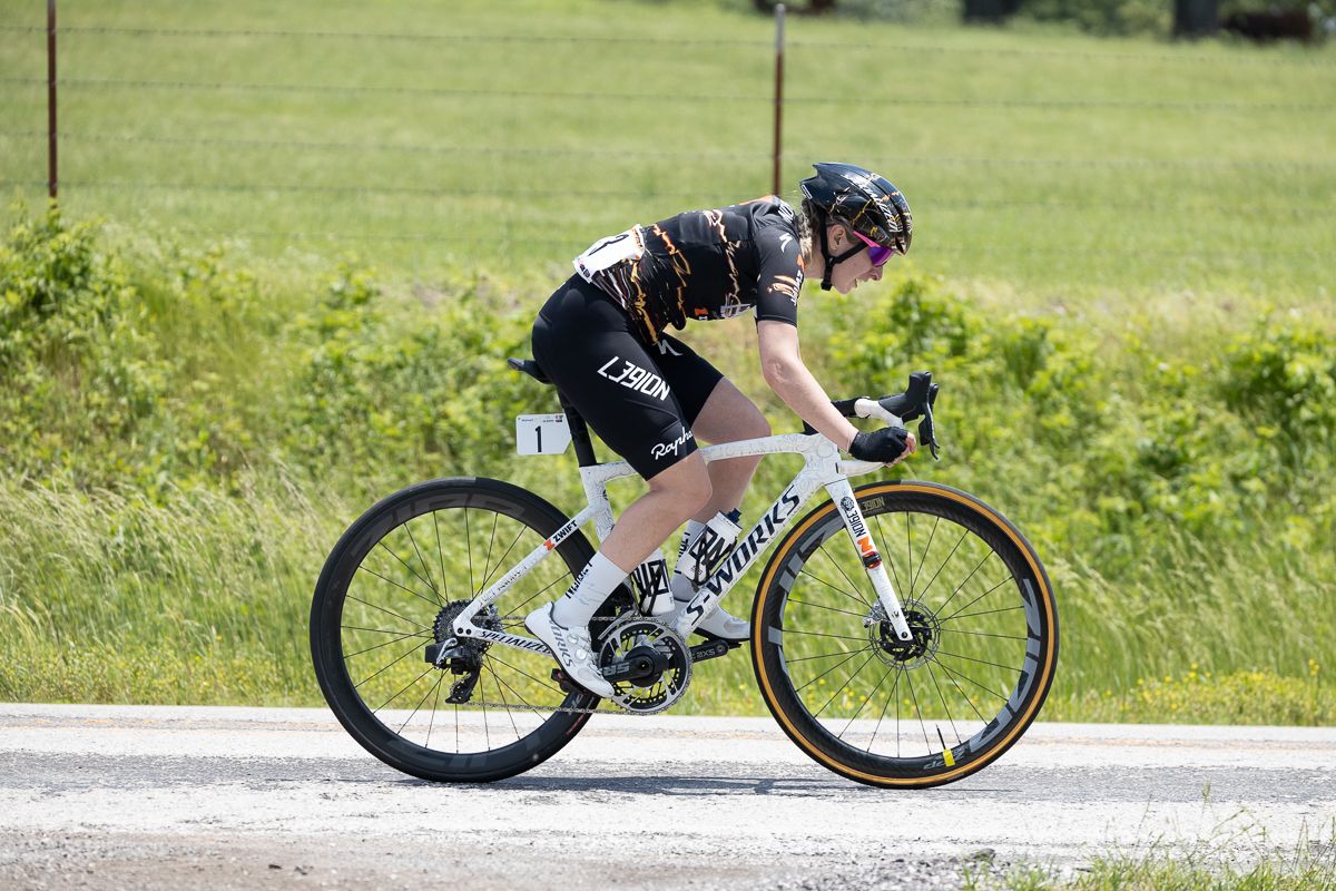 Samantha Schneider (#3), L39ION of Los Angeles, ended up well off the back of the main group riding a bike that didn't fit her after swapping bikes with her sister Skyler (#1), who picked up a shard of metal in her tire right before the drop into Devil's Den.