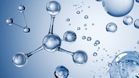 A series of ball-and-stick shaped transparent molecules against a blue background