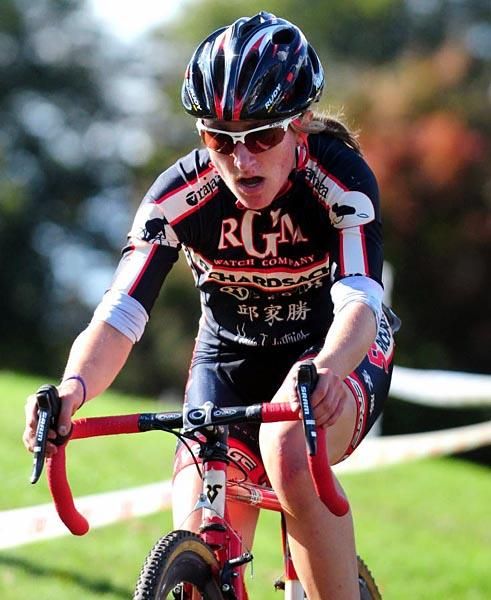 Amy Dombroski (Richard Sachs-RGM Watches) riding consistently in third.