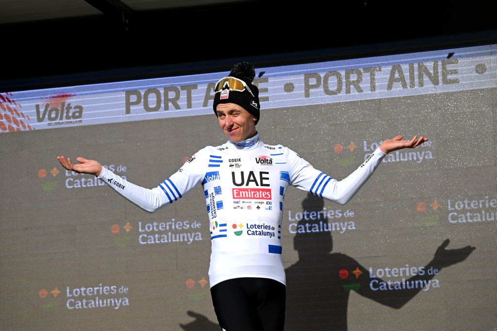 PORT AINE SPAIN MARCH 20 Tadej Pogacar of Slovenia and UAE Emirates Team celebrates at podium as Blue Points Jersey winner during the 103rd Volta Ciclista a Catalunya 2024 Stage 3 a 1767km stage from Sant Joan de les Abadesses to Port Aine 1967m UCIWT on March 20 2024 in Port Aine Spain Photo by David RamosGetty Images