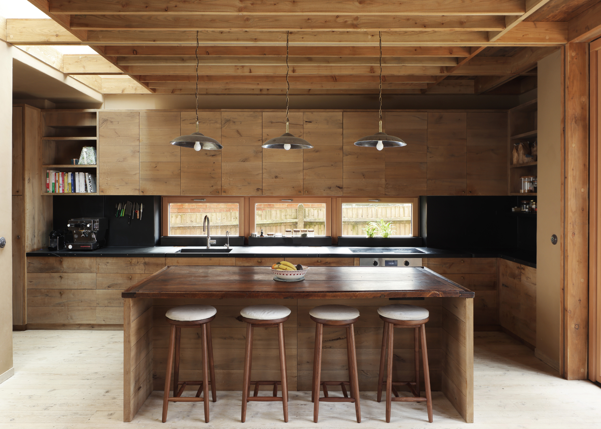 all wooden kitchen with pendant lighting