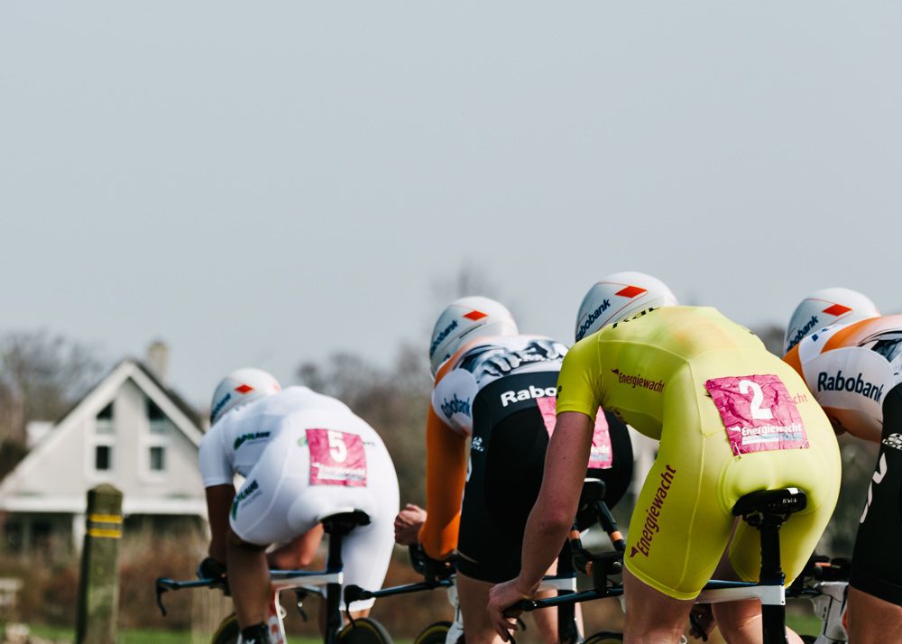 Anna van der Breggen rides at the back