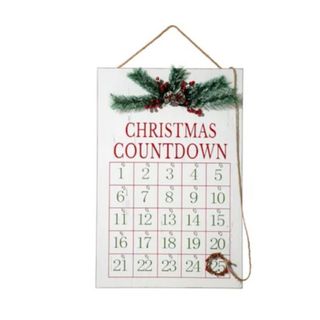 A rectangular Christmas calendar with numbers and a sign that says 