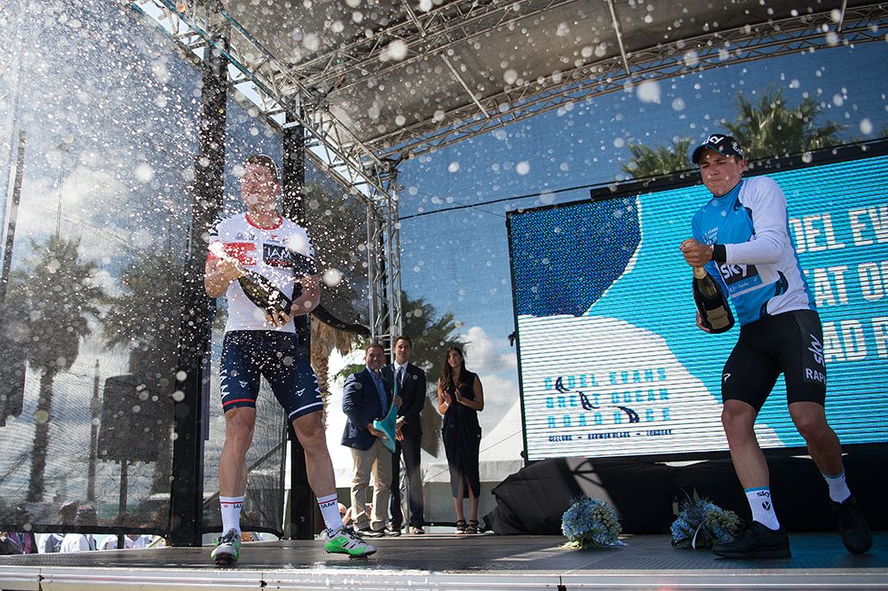 the podium finishers spray the champagne