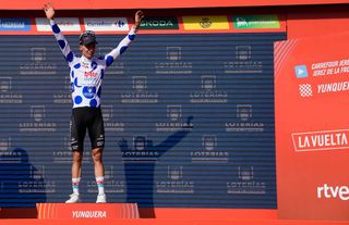 The best climber Team Lottos Sylvain Moniquet celebrates on the podium wearing the dot jersey after the stage 6 of La Vuelta a Espana cycling tour a 1855 km race between Jerez de la Frontera and Yunquera on August 22 2024 Photo by CRISTINA QUICLER AFP Photo by CRISTINA QUICLERAFP via Getty Images