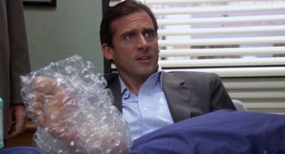 Michael with his grilled foot in The Office