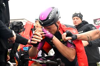 TRE CIME DI LAVAREDO ITALY MAY 26 Jonathan Milan of Italy and Team Bahrain Victorious Purple Points Jersey reacts after the 106th Giro dItalia 2023 Stage 19 a 183km stage from Longarone to Tre Cime di Lavaredo 2307m UCIWT on May 26 2023 in Tre Cime di Lavaredo Italy Photo by Stuart FranklinGetty Images