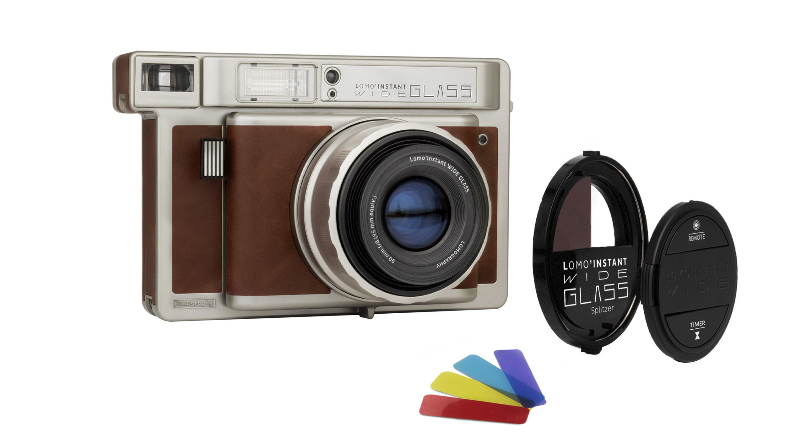 Lomo Instant Wide Glass instant camera with color gels and lens mod accessories on white background