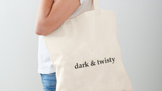 A Grey's Anatomy tote bag reads "Dark & Twisty"