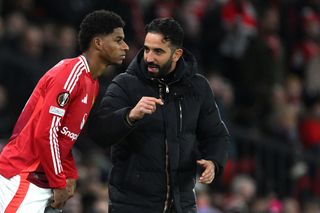 MANCHESTER, ENGLAND - NOVEMBER 28: Ruben Amorim, Head Coach of Manchester United, speaks to Marcus Rashford of Manchester United as he prepares to enter the pitch as a substitute during the UEFA Europa League 2024/25 League Phase MD5 match between Manchester United and FK Bodo/Glimt at Old Trafford on November 28, 2024 in Manchester, England. (Photo by Justin Setterfield/Getty Images)