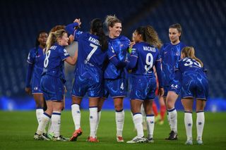 Mayra Ramirez of Chelsea celebrates with teammates after scoring her team's third goal during the UEFA Women's Champions League match between Chelsea FC and FC Twente at Stamford Bridge on December 11, 2024 in London, England.