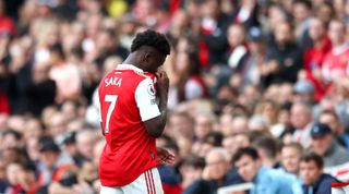 Arsenal's Bukayo Saka leaves the pitch after being substituted due to injury during the Premier League match between Arsenal and Nottingham Forest on 30 October, 2022 at the Emirates Stadium, London, United Kingdom