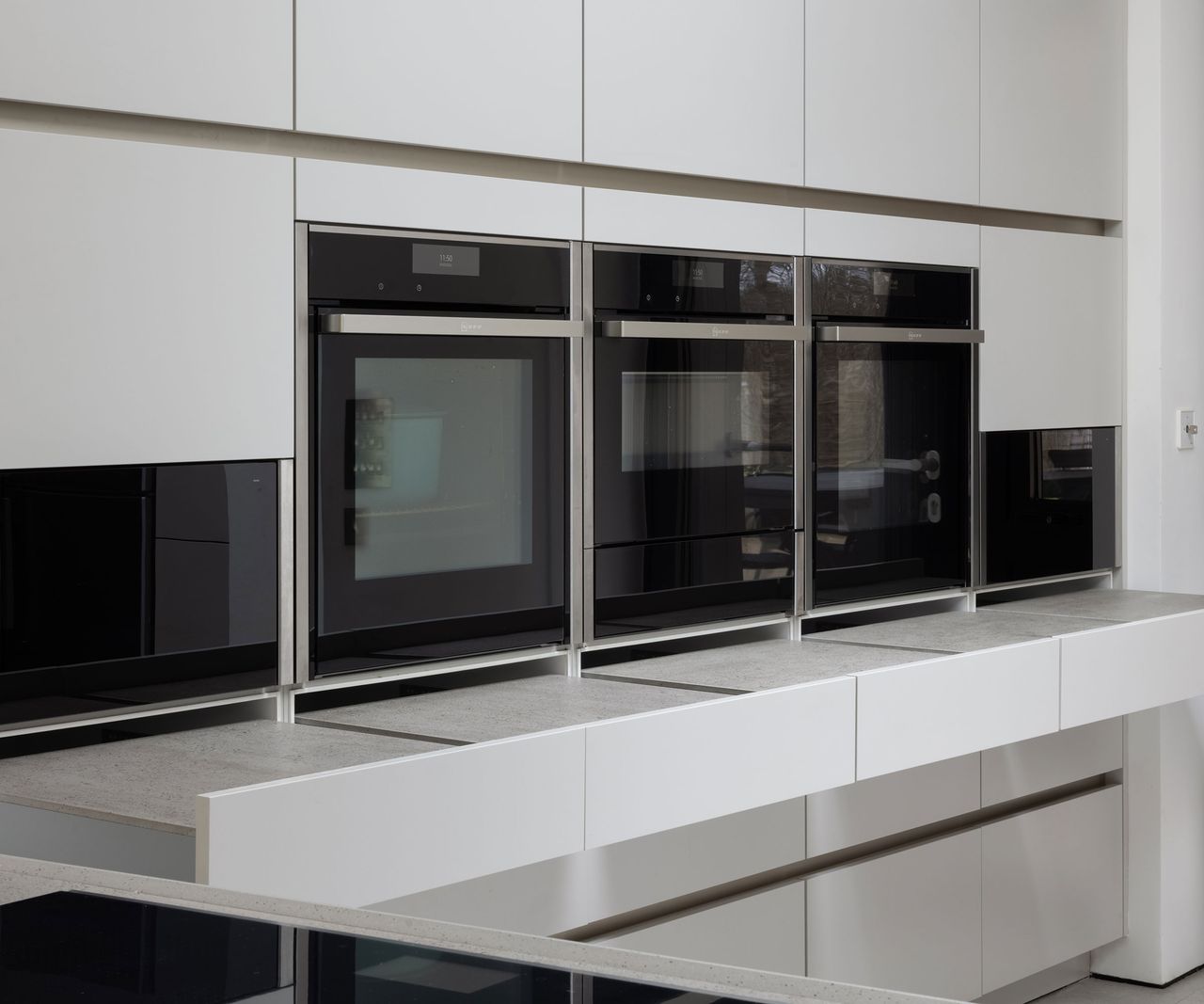 built in ovens with pull out worktops beneath