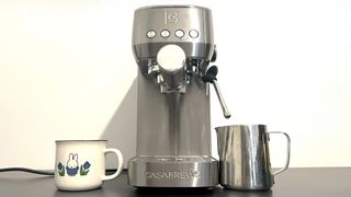 Casabrews 3700 Essential on kitchen counter with milk jug and mug