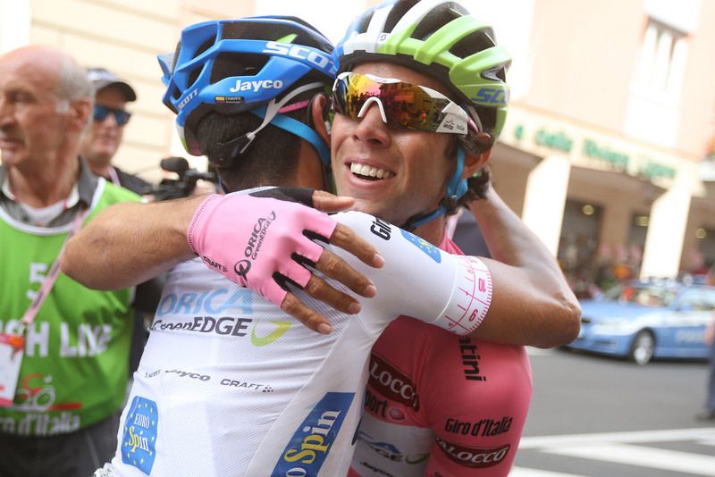 Esteban Chaves congratulates teammates Michael Matthews on his win in the pink jersey