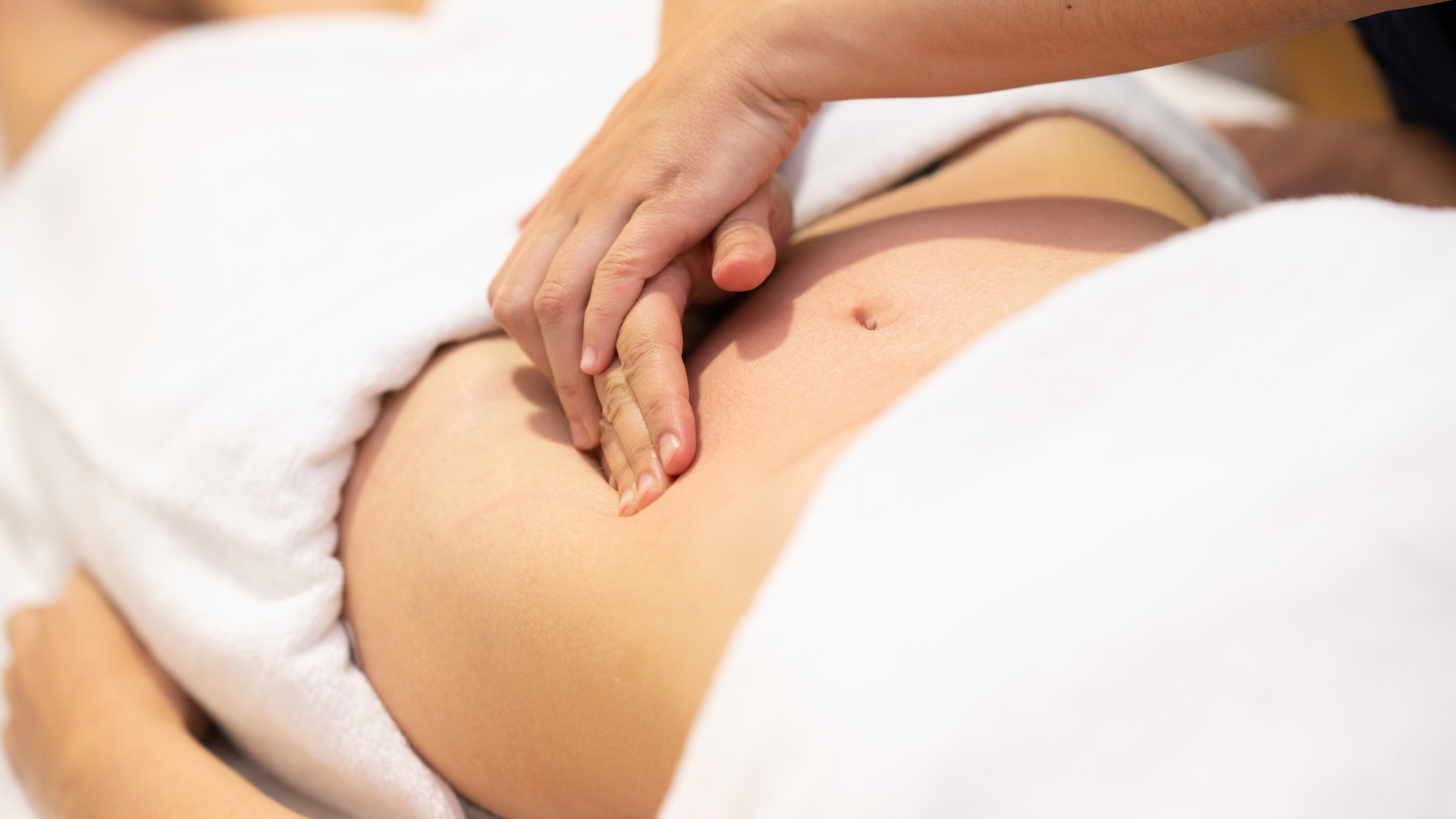 woman getting a postpartum massage
