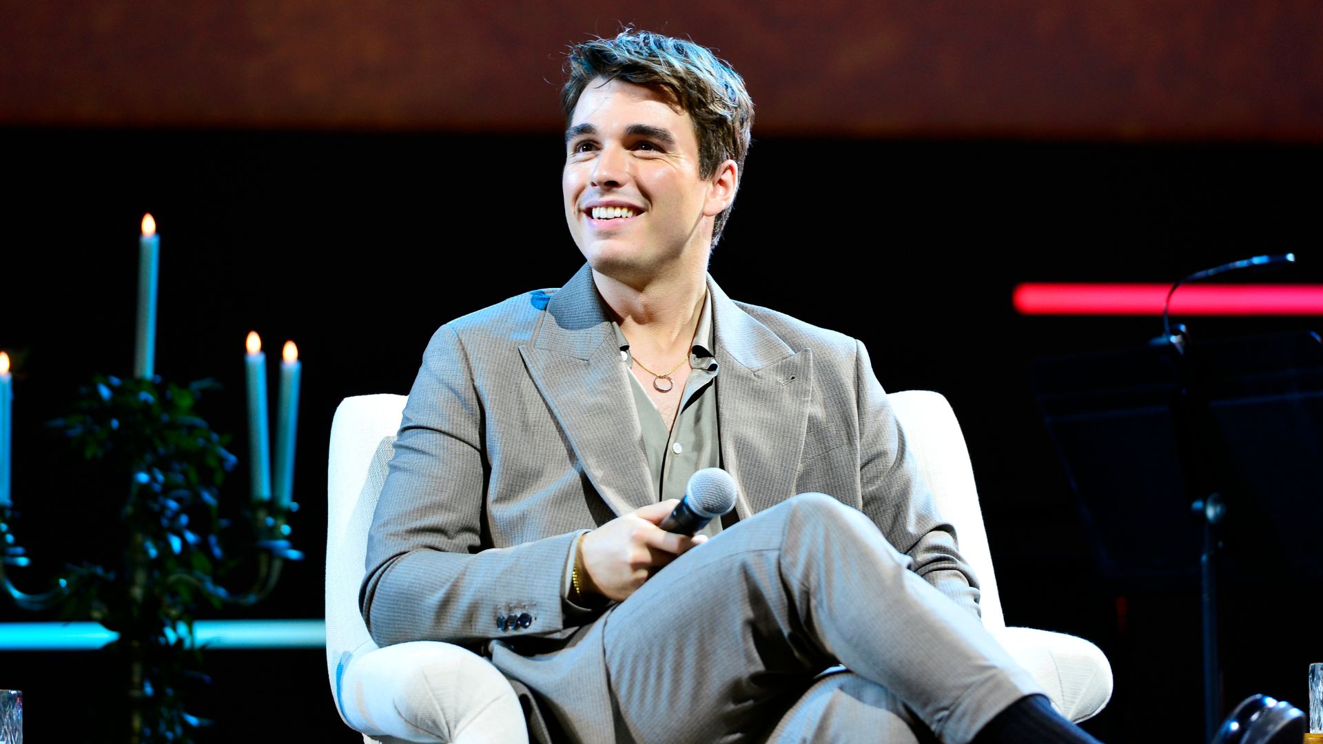 Corey Mylchreest speaking onstage during Netflix&#039;s FYSEE An Evening with Queen Charlotte at Red Studios on May 16, 2023 in Los Angeles