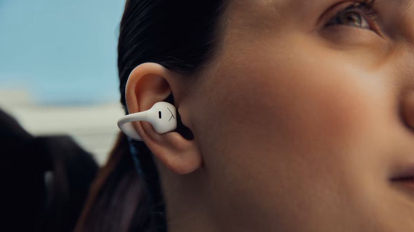 Amiron Zero headphones in a woman&#039;s ear