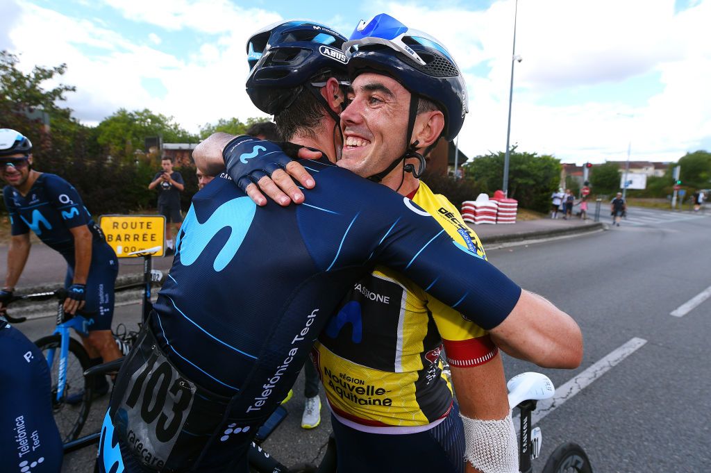 LIMOGES FRANCE AUGUST 19 LR Imanol Erviti of Spain and Alex Aranburu Deba of Spain and Movistar Team Yellow Leader Jersey celebrate the victory of the 55th Tour du Limousin Nouvelle Aquitaine 2022 Stage 4 a 1748km stage from Saint Laurent sur Gorre to Limoges 289m TDL2022 on August 19 2022 in Limoges France Photo by Dario BelingheriGetty Images