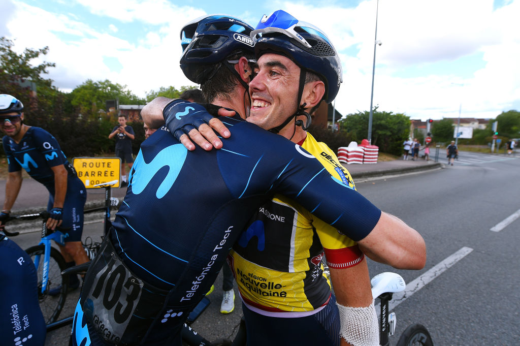 LIMOGES FRANCE AUGUST 19 LR Imanol Erviti of Spain and Alex Aranburu Deba of Spain and Movistar Team Yellow Leader Jersey celebrate the victory of the 55th Tour du Limousin Nouvelle Aquitaine 2022 Stage 4 a 1748km stage from Saint Laurent sur Gorre to Limoges 289m TDL2022 on August 19 2022 in Limoges France Photo by Dario BelingheriGetty Images
