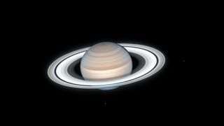 The ringed planet Saturn still puzzles astronomers.